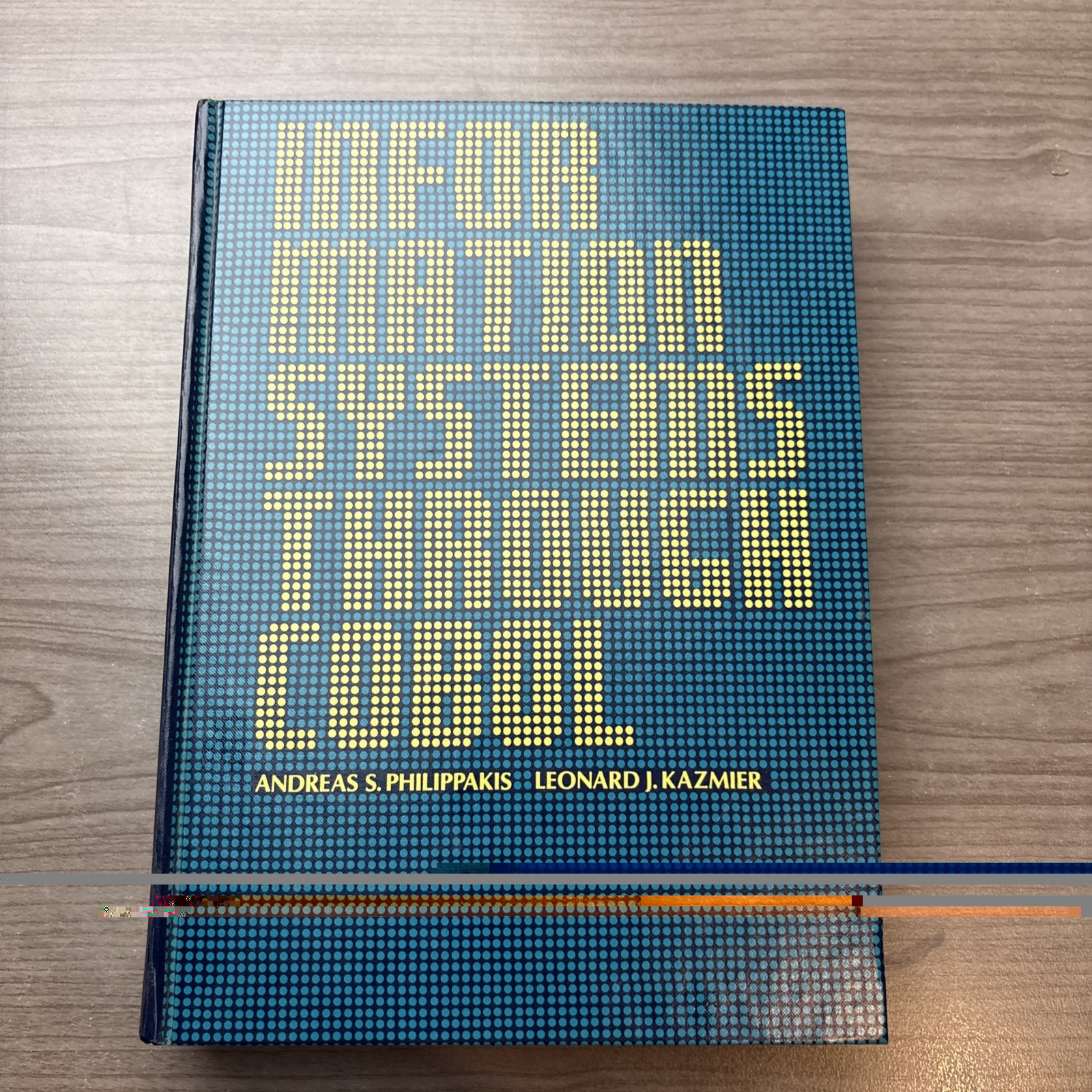 Information Systems Through COBOL Andreas S. Philippakis & Leonardo J. Kazmier H