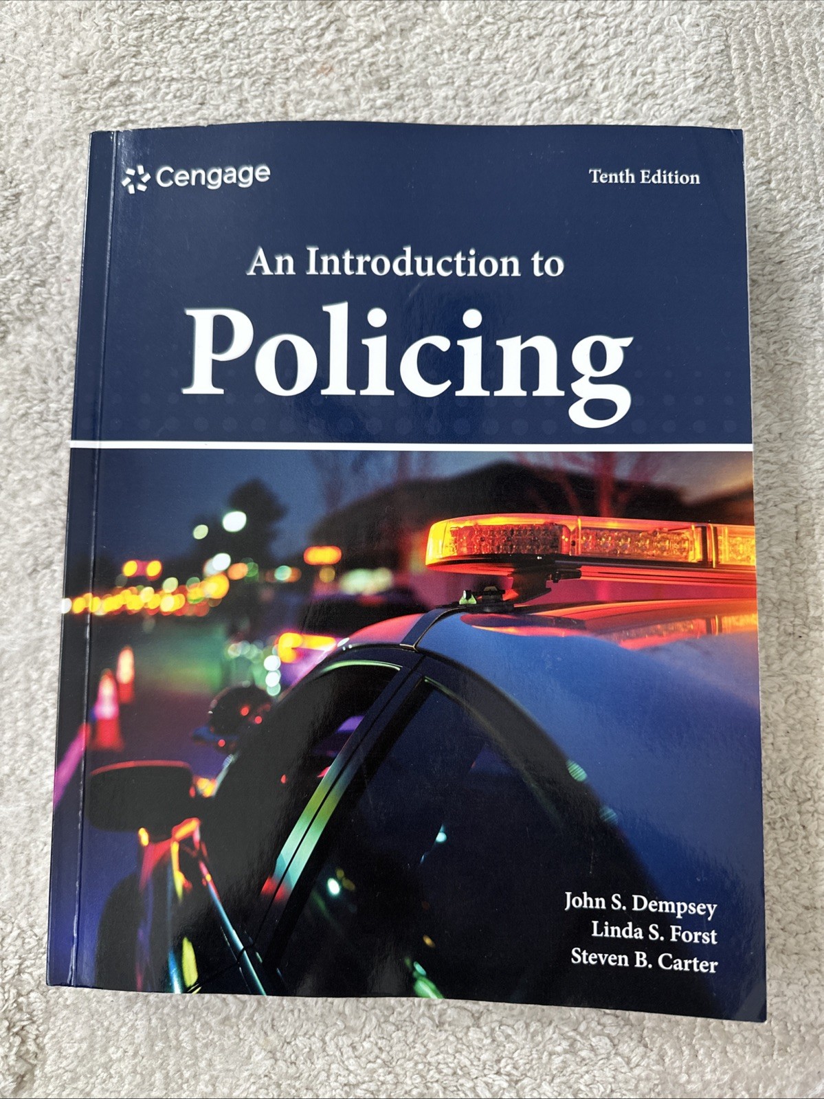 An Introduction to Policing 10th Ed. Paperback .*Unused W/cover damage