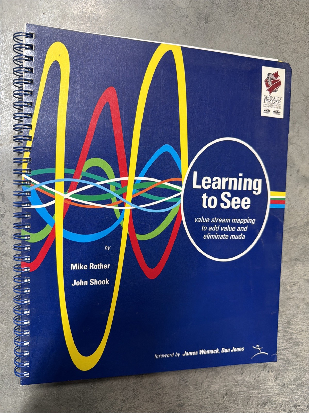 Learning to See : Value-stream mapping to create value and eliminate Muda